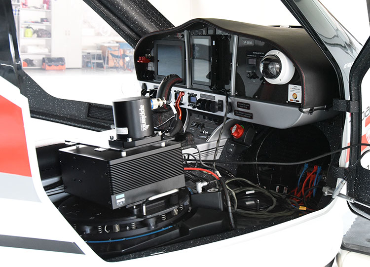The cockpit of the ALTER-EYE aircraft with an example of the sensors setup.